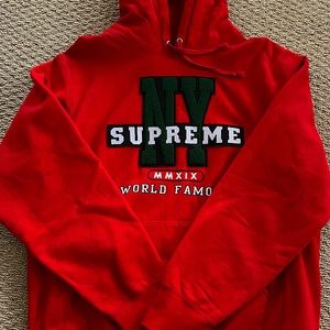 Supreme NY World Famous Hooded Sweatshirt - size Medium - color Red